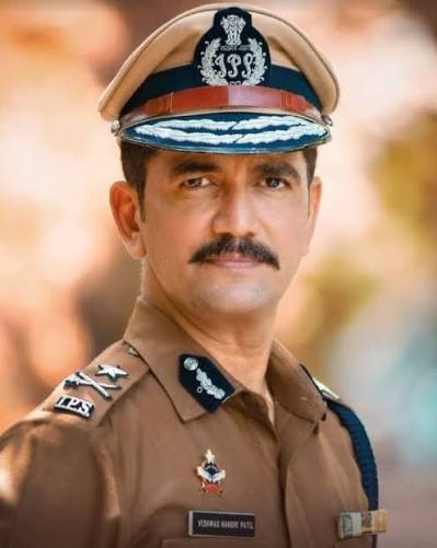 Vishwas Nangre Patil in ceremonial Indian Police Service uniform and peaked cap
